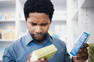 Buy stock photo Black man, pharmacy stock check and pharmacist in a wellness, healthcare and drugs clinic. Reading, medical information and a retail pharmaceutical worker with pills storage and store supplements