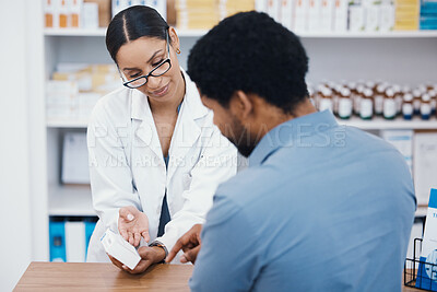 Buy stock photo Pharmacist, woman or helping customer with medicine information, pills instruction or medical consulting in store. Pharmacy worker, black man or patient with drugs questions on healthcare product box