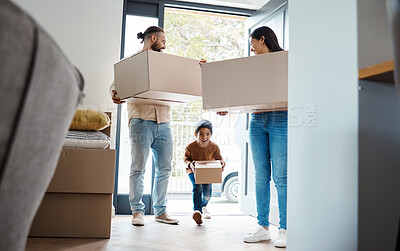 Buy stock photo Family moving, new house and box with property, happy people and child with real estate and home owner. Excited kid, mortgage and relocation parents walking in front door with apartment move boxes