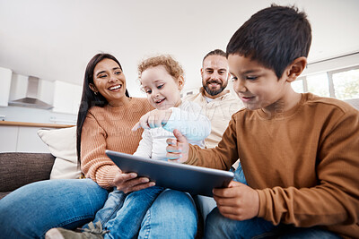 Buy stock photo Happy, tablet and bonding with family on sofa for search, streaming and fun games. Technology, internet and connection with parents and children browsing online at home on social media app or website