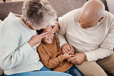 Buy stock photo Love, grandparents and boy play on couch, happiness and bonding together for quality time. Family, granny and grandad with grandchild, playing and smile in living room, loving and enjoy retirement