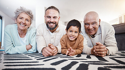 Buy stock photo Happy, portrait and family on the floor for bonding, playing and quality time. Smile, happiness and father, child and grandparents lying on the living room during a visit together in a house
