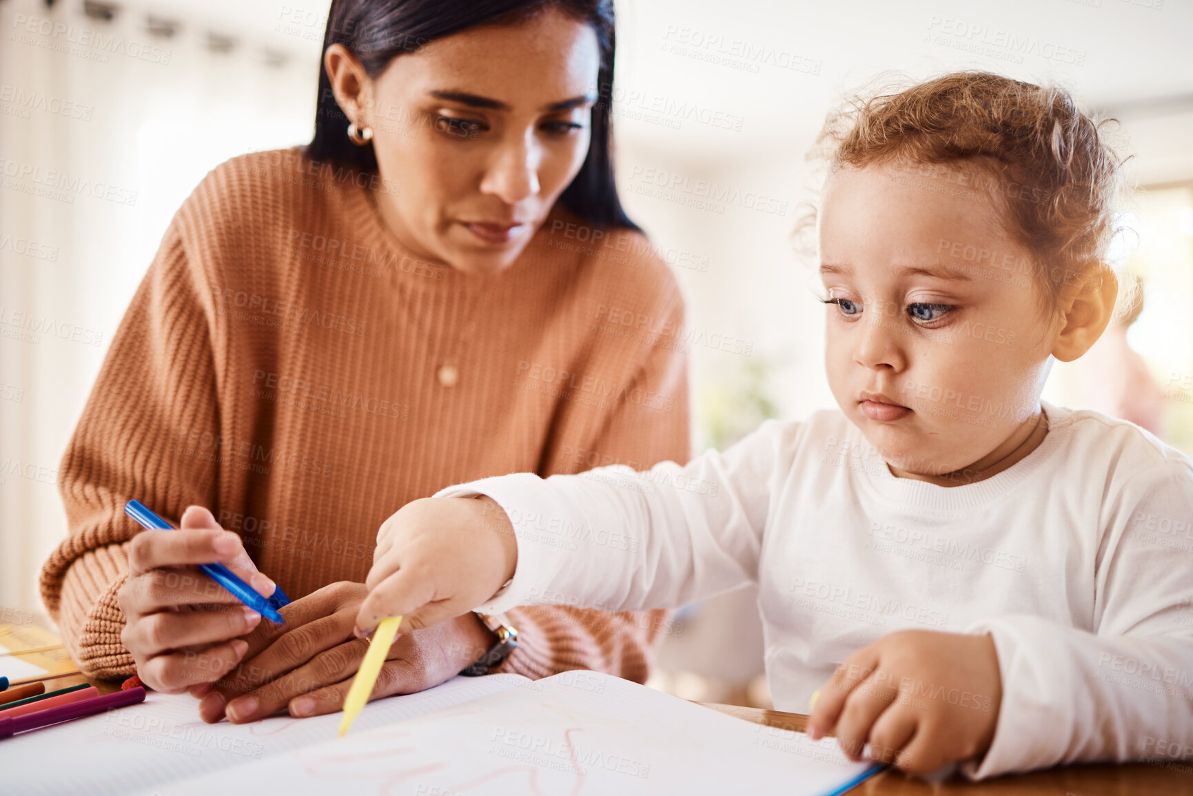 Buy stock photo Home school, learning and mother doing an activity with her child for education and childhood development. Knowledge, homework and young mom teaching her toddler kid to do a creative drawing or write