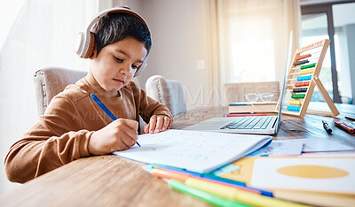Buy stock photo Learning headphones, math education and kid in home with book for studying, homework or homeschool. Development, laptop or boy or child with notebook for numbers in elearning, virtual or online class