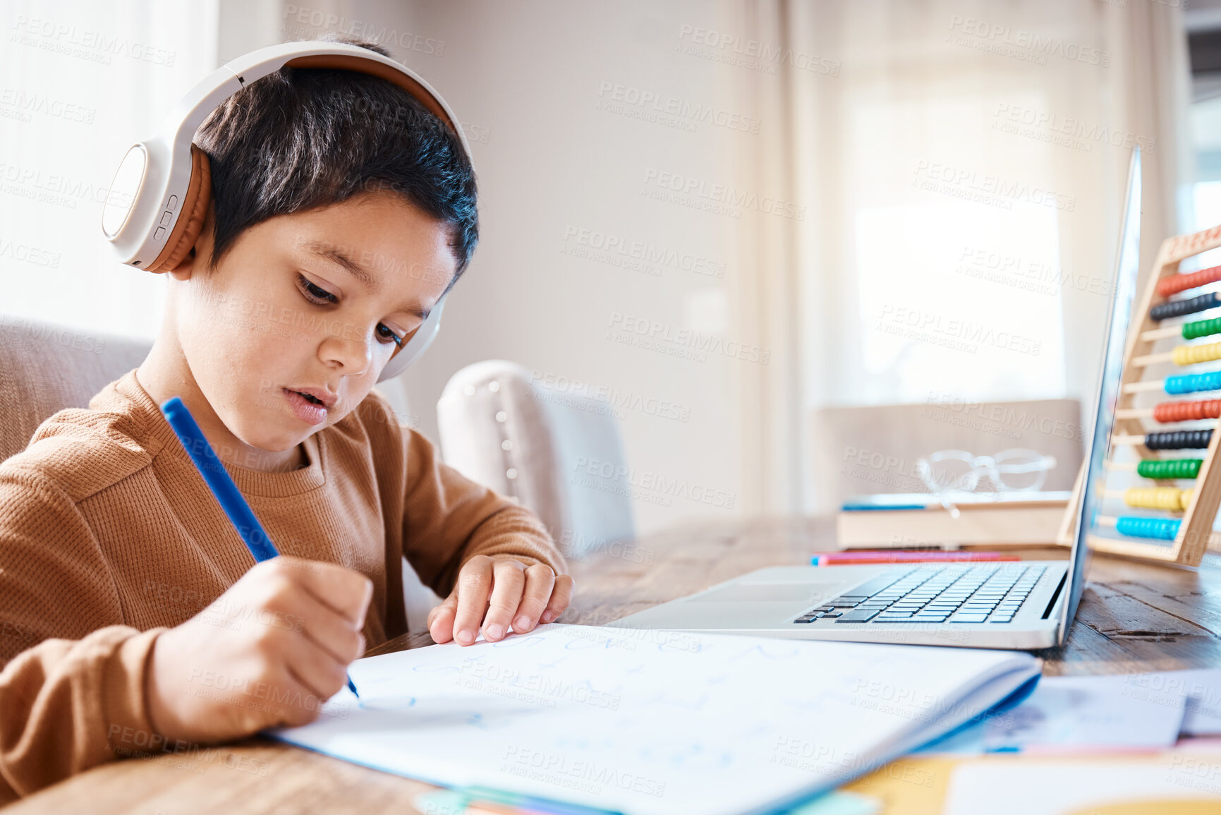 Buy stock photo Learning headphones, math education and child in home with book for studying, homework or homeschool. Development, laptop or boy or kid with notebook for numbers in elearning, virtual or online class