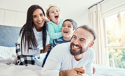 Buy stock photo Portrait, family and laughing on bed in home, having fun and bonding together. Comic, love and care of happy father, mother and kids or boys playing, smile and enjoying quality time in house bedroom.