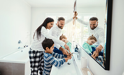 Buy stock photo Family, washing hands and bathroom with a mom, father and children with hygiene care in morning. Mother, kids and dad together with love, support and youth in a home doing self care at a sink