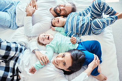Buy stock photo Morning, laugh and happy with family in bedroom for wakeup, affectionate and bonding from top view. Smile, care and funny with parents and children in bed at home for playful, happiness and support