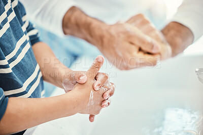 Buy stock photo Family, cleaning hands and washing in sink in bathroom for health, hygiene and wellness. Water splash, children and father with kid to wash with soap for disinfection, sanitize or skincare in house.