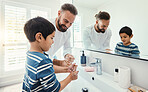 Cleaning, washing hands and father with boy in bathroom for hygiene, wellness and healthcare at home. Family, skincare and dad with child learning to wash with water, soap and disinfection by faucet