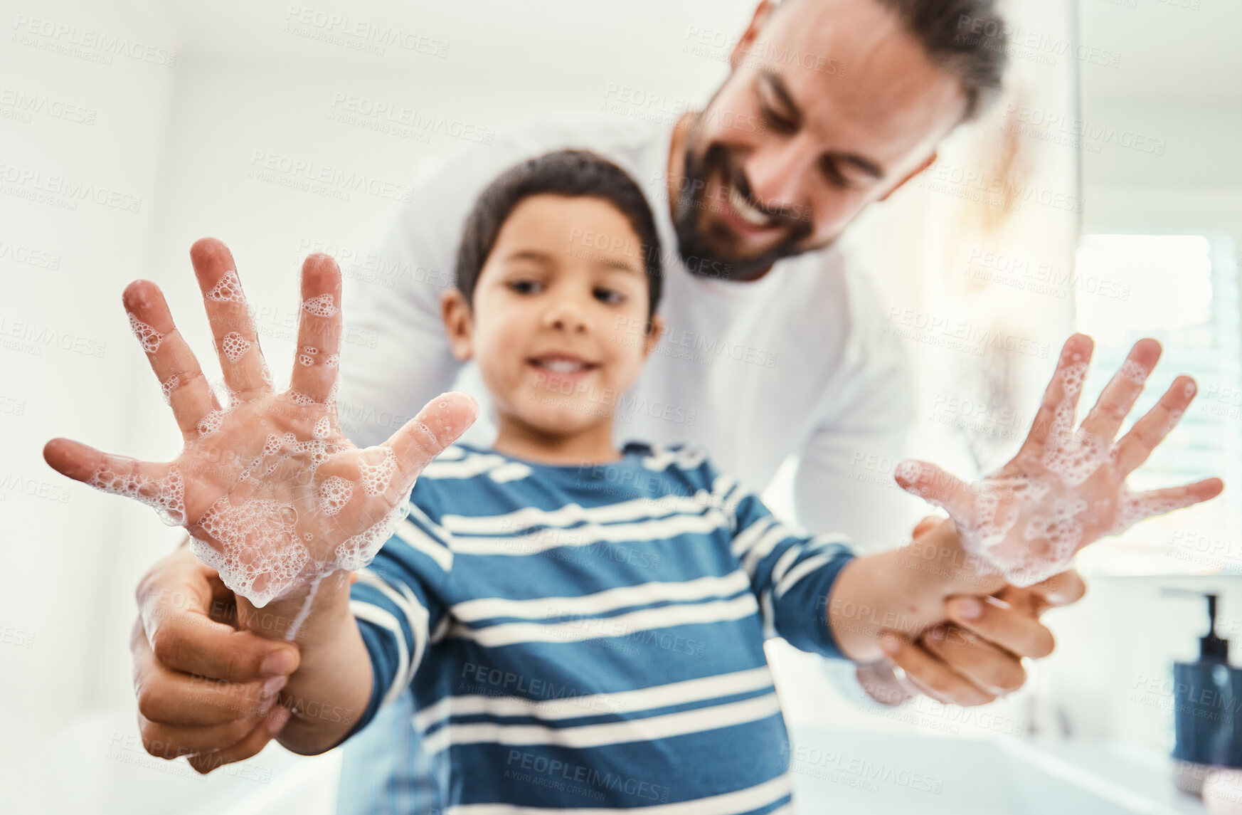 Buy stock photo Hands, soap and father with boy in bathroom for hygiene, wellness and healthcare at home. Family, skincare and dad with child smile learn to washing palms with water, foam and disinfection by faucet