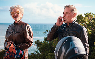 Buy stock photo Smoking, road trip and a senior biker couple outdoor together for an adventure ride during retirement. Smoke, travel or journey with a mature man and woman on the coast for a summer joyride