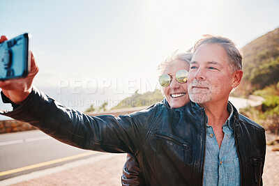 Buy stock photo Senior biker couple, road trip selfie and smile with sunglasses, love and romance on vacation in nature. Elderly lady, happy and travel with old man, profile picture and smile for social network app