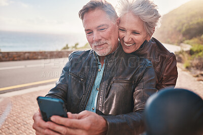 Buy stock photo Selfie, biker couple and road trip, smile and laughing, love and romance on vacation outdoors. Travel, retirement and senior man and woman traveling on motorbike to take pictures for happy memory.