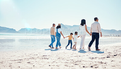 Buy stock photo Beach, love and big family holding hands while walking on a vacation, adventure or weekend trip. Travel, seaside and children on walk with their parents and grandparents by the ocean while on holiday