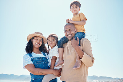 Buy stock photo Family piggyback, portrait and smile at beach on vacation, having fun and bonding with mockup. Holiday, relax and care of happy father, mother and kids or children by seashore enjoying time outdoors.