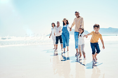 Buy stock photo Happy, portrait and a big family holding hands at the beach for a walk, bonding and playing. Love, carefree and children walking at the sea with grandparents and parents on a holiday in Spain