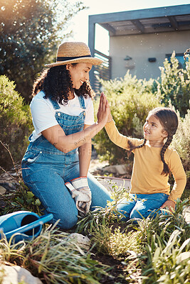 Buy stock photo Family, children or high five with a mother and daughter gardening while planting plants together. Nature, kids or landscaping with a woman and female child working in the garden during spring