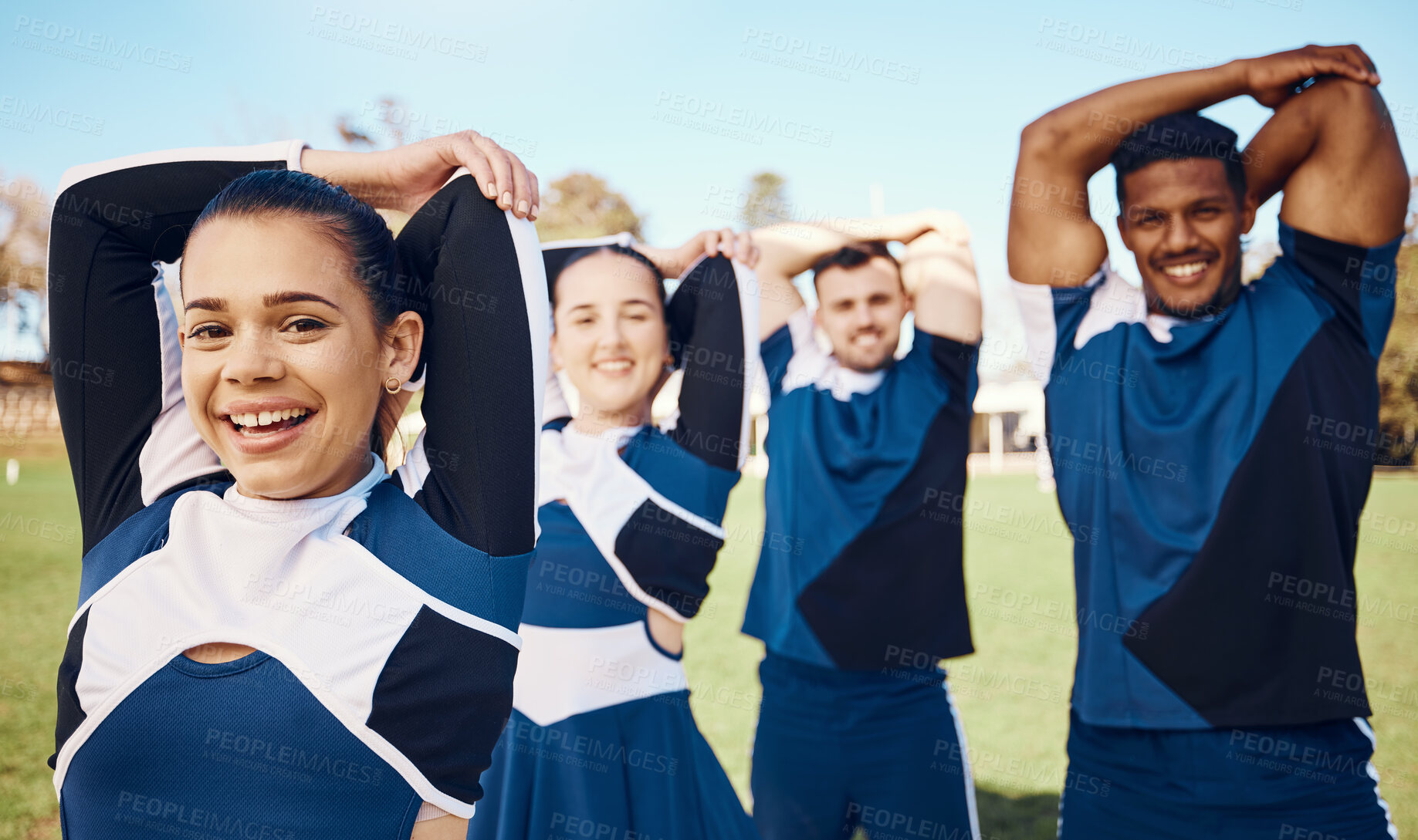 Buy stock photo Cheerleader training or portrait of team stretching on a outdoor stadium field for fitness exercise. Cheerleading group, sports workout or happy people game ready for cheering, match or campus event 