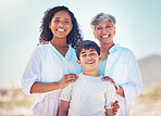 Portrait of mom, grandma and son with smile and happy family bonding together on outdoor vacation. Sun, fun and happiness for mother, hispanic senior woman and boy child on summer holiday in Mexico.