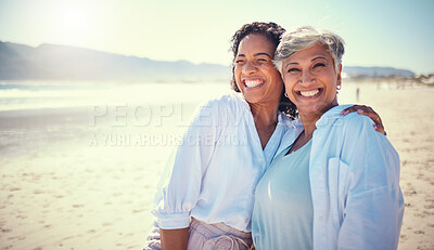 Buy stock photo Mother with her adult daughter at the beach while on a vacation, weekend trip or summer getaway. Happy, smile and woman embracing her senior mom by the ocean while on a tropical holiday or adventure.