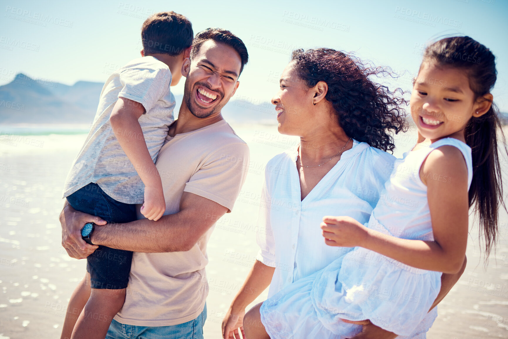 Buy stock photo Happy family, laughing and beach hug of a mother, father and girl together by the ocean. Nature, sea and love of a mom, dad and child from the Philippines on vacation with parents on travel holiday