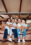 Love, portrait and happy big family relax, bonding and enjoy quality time together on house living room sofa. Happiness, home reunion and senior grandparents, parents and children smile in Costa Rica