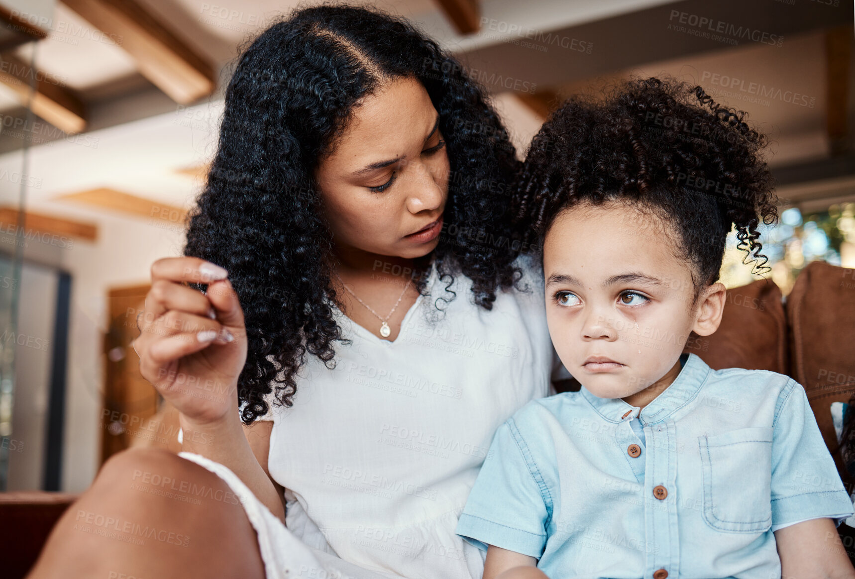 Buy stock photo Comfort, support and mother with crying child sitting on floor in living room and talking after tantrum. Anxiety, security and trust, woman comforting sad boy with love and safety from mom at home.