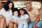 Tablet, happy family and kids with online video, movies or cartoon together for love, learning or bonding. Biracial mother, father and children watch film, show and relax on digital tech for holiday