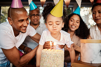 Buy stock photo Birthday, party and cake for boy with parents and grandparents together for celebrating, bond and fun. Joy, event and child blowing candles with family at table, happy and excited for celebration