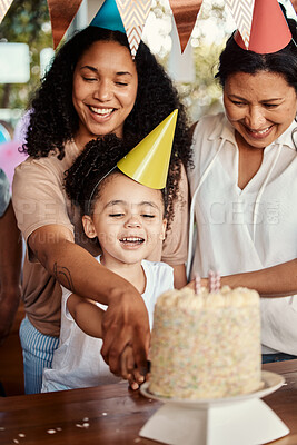 Buy stock photo Birthday, party and cake for girl with mother and grandmother together for celebrating, bond and fun. Candle, event and child with parents and grandparent at table, happy and excited for celebration