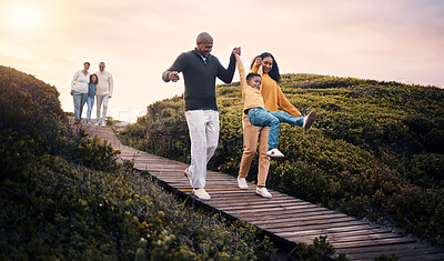 Buy stock photo Family, walking or sunset with parents, kids and grandparents playing together outdoor in nature. Spring, love or environment with children and senior relatives taking a walk while bonding