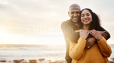 Buy stock photo Hug, happy and portrait of a couple at the beach for a date, bonding or sunset in Bali. Love, embrace and young man and woman smiling while relaxing at the ocean for vacation with mockup space