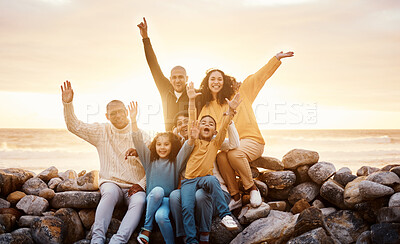 Buy stock photo Happy, carefree and portrait of a big family at the beach for freedom, holiday and happiness. Together, sunset and parents, children and grandparents by the ocean in Portugal for a summer vacation
