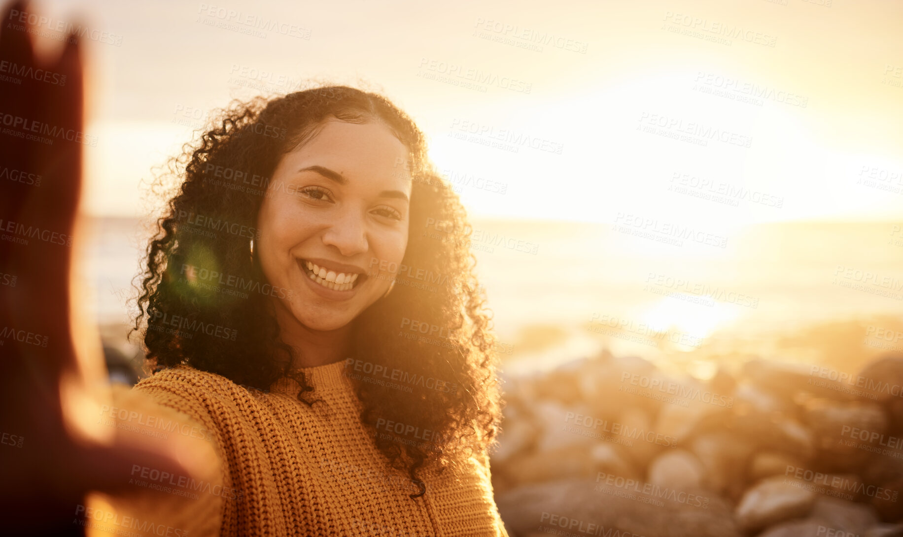 Buy stock photo Selfie, sunset and mockup with a black woman on the beach during summer for a holiday or vacation. Portrait, sunrise and flare with an attractive young female posing for a photograph on the coast
