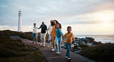 Buy stock photo Family, walking or sunset with parents, black kids and grandparents spending time together in nature. Spring, love or environment with children and senior relatives taking a walk while bonding
