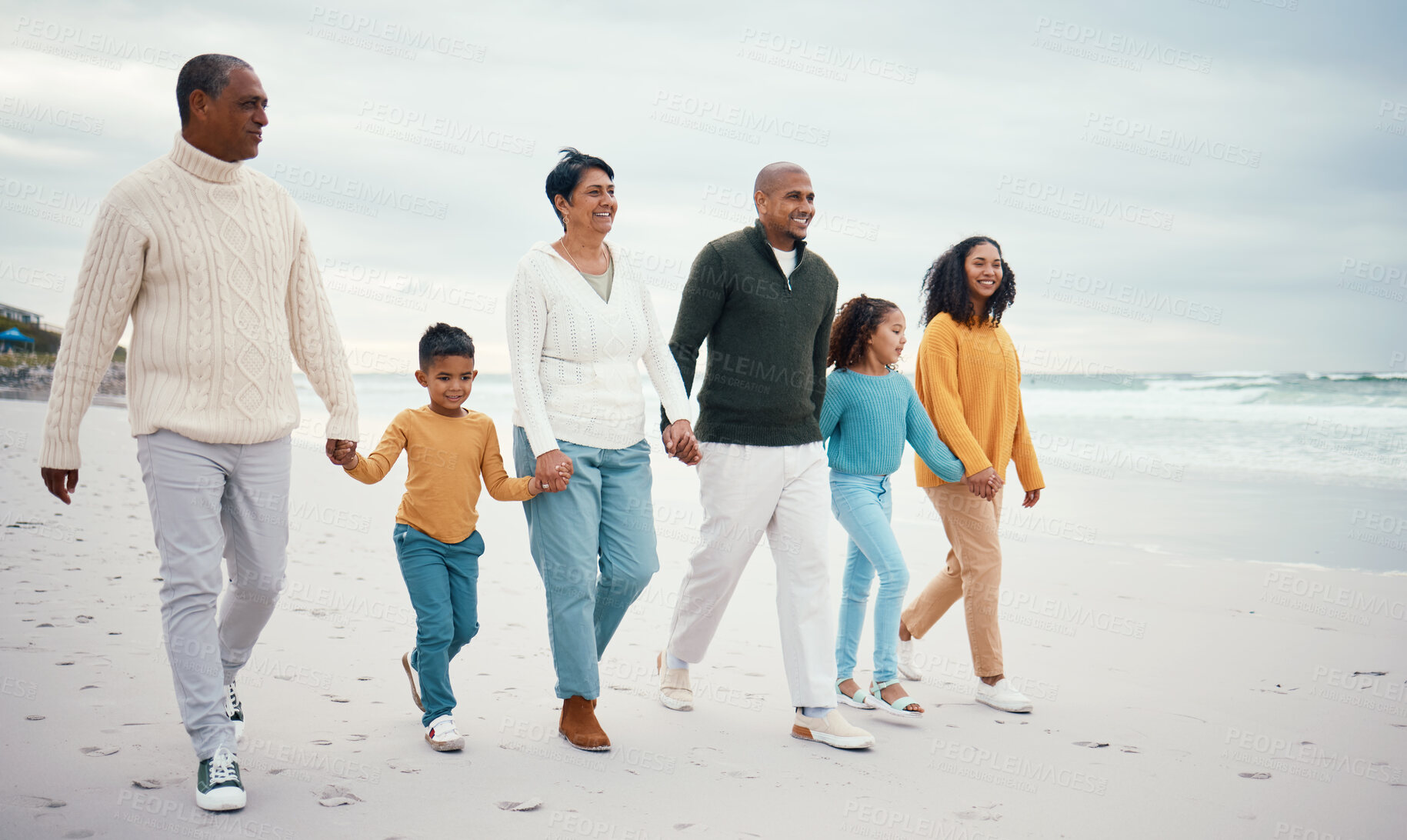 Buy stock photo Happy grandparents, parents and children on beach enjoying holiday, travel vacation and weekend together. Big family, relax and happy people holding hands for bonding, quality time and walking by sea
