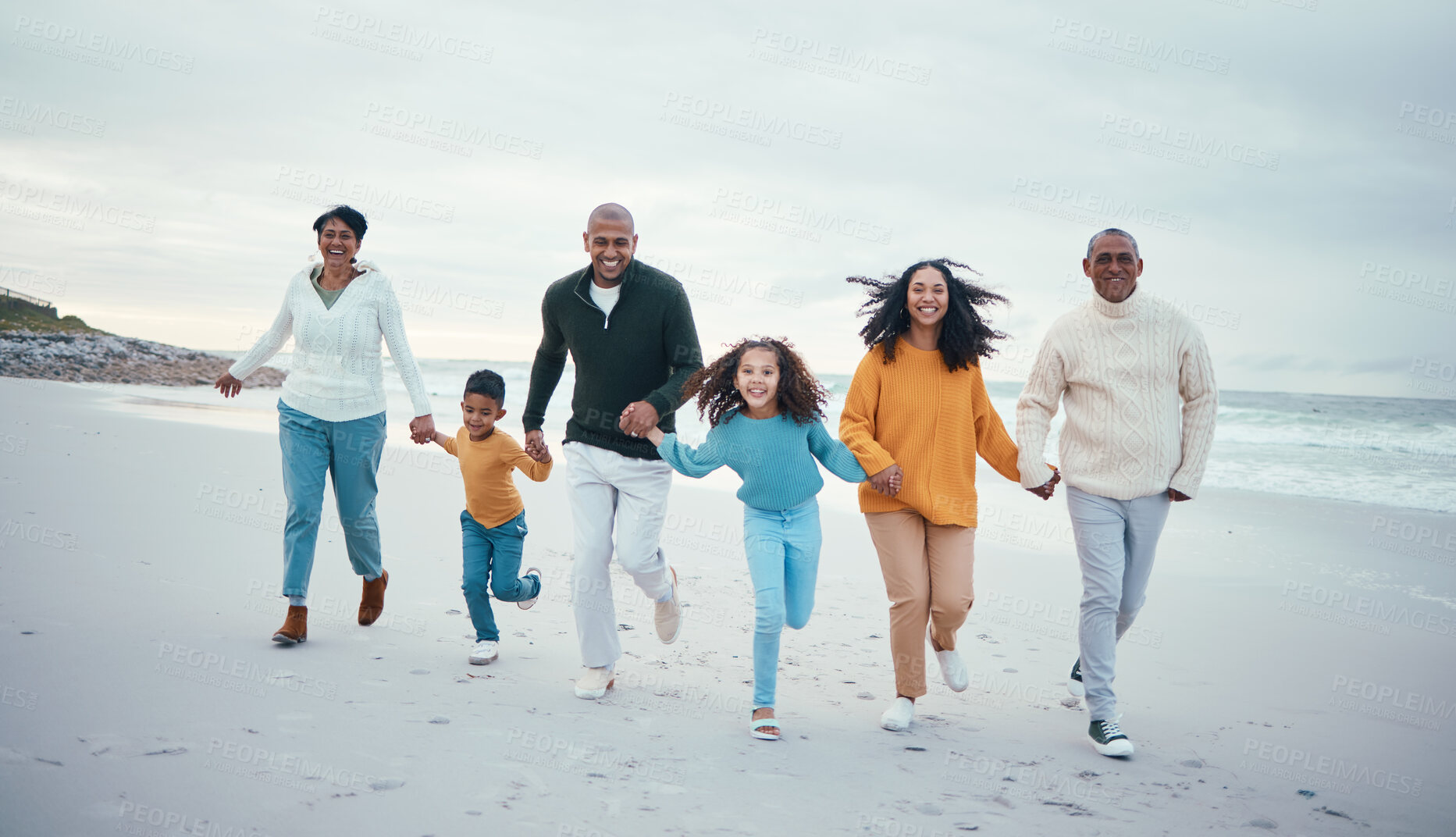 Buy stock photo Grandparents, parents and children running on beach enjoy holiday, travel vacation and weekend together. Relax, smile and happy family portrait holding hands for bonding, quality time and fun by sea