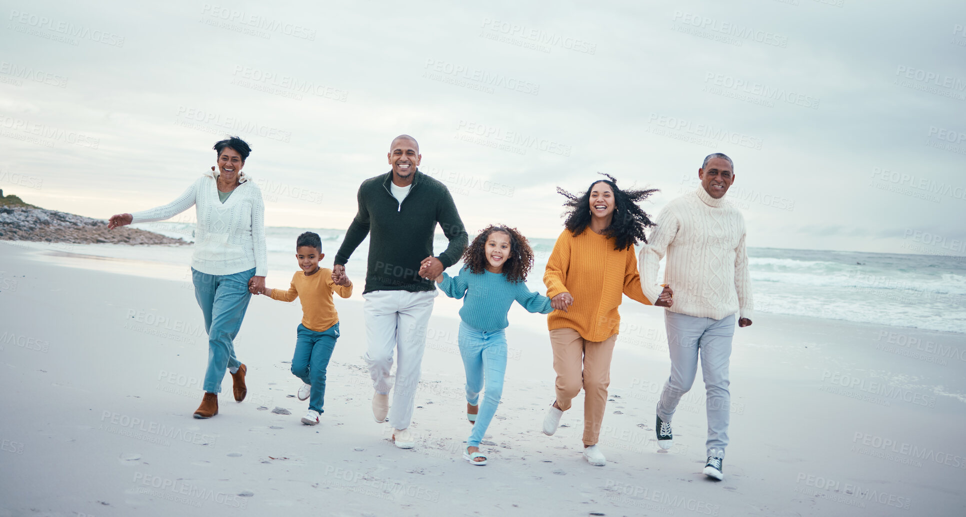 Buy stock photo Running, smile and portrait of family on beach enjoy holiday, travel vacation and weekend together. Love, happy and grandparents, mom and dad with kids holding hands for bond, quality time and fun