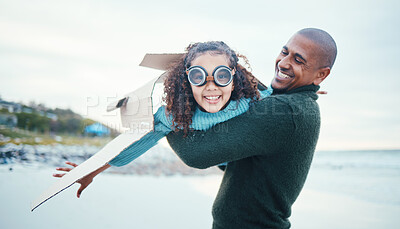 Buy stock photo Beach, black family and daughter flying with her father while playing fantasy or pretend with imagination. Portrait, fun or plane with a man parent and girl child pilot bonding through play