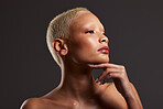 Beauty, makeup and profile of black woman in dark studio with platinum hair isolated on grey background. Art aesthetic, cosmetics and face of beautiful African model with luxury spa facial skin care.