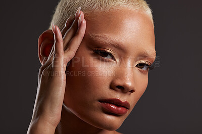 Buy stock photo Beauty, makeup and lipstick, portrait of black woman in dark studio with platinum hair isolated on grey background. Art aesthetic, cosmetics and African model with hand on face and luxury spa facial.
