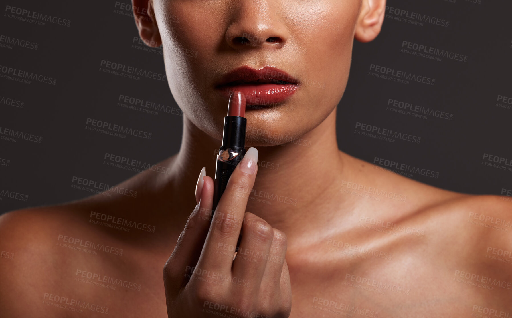 Buy stock photo Makeup, lips and hands of woman with lipstick in studio for cosmetics and skincare products. Salon aesthetic, cosmetology and girl model with red gloss for beauty, mouth and luxury style