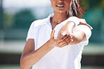 Tennis, sports woman and elbow injury with pain, first aid emergency and medical health risk. Closeup arm of female athlete with accident on training court, fitness mistake and injured muscle problem