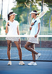 Tennis, teamwork and black women talking on court after match, game or competition. Sports collaboration, friends or smile of happy girls laughing after fitness exercise, workout or training outdoors