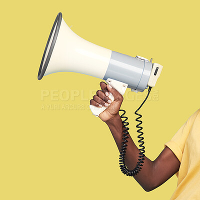 Buy stock photo Black woman, hands and megaphone on mockup for announcement, advertising or marketing against a yellow studio background. Hand holding bullhorn for loud voice, speech or news on mock up or copy space