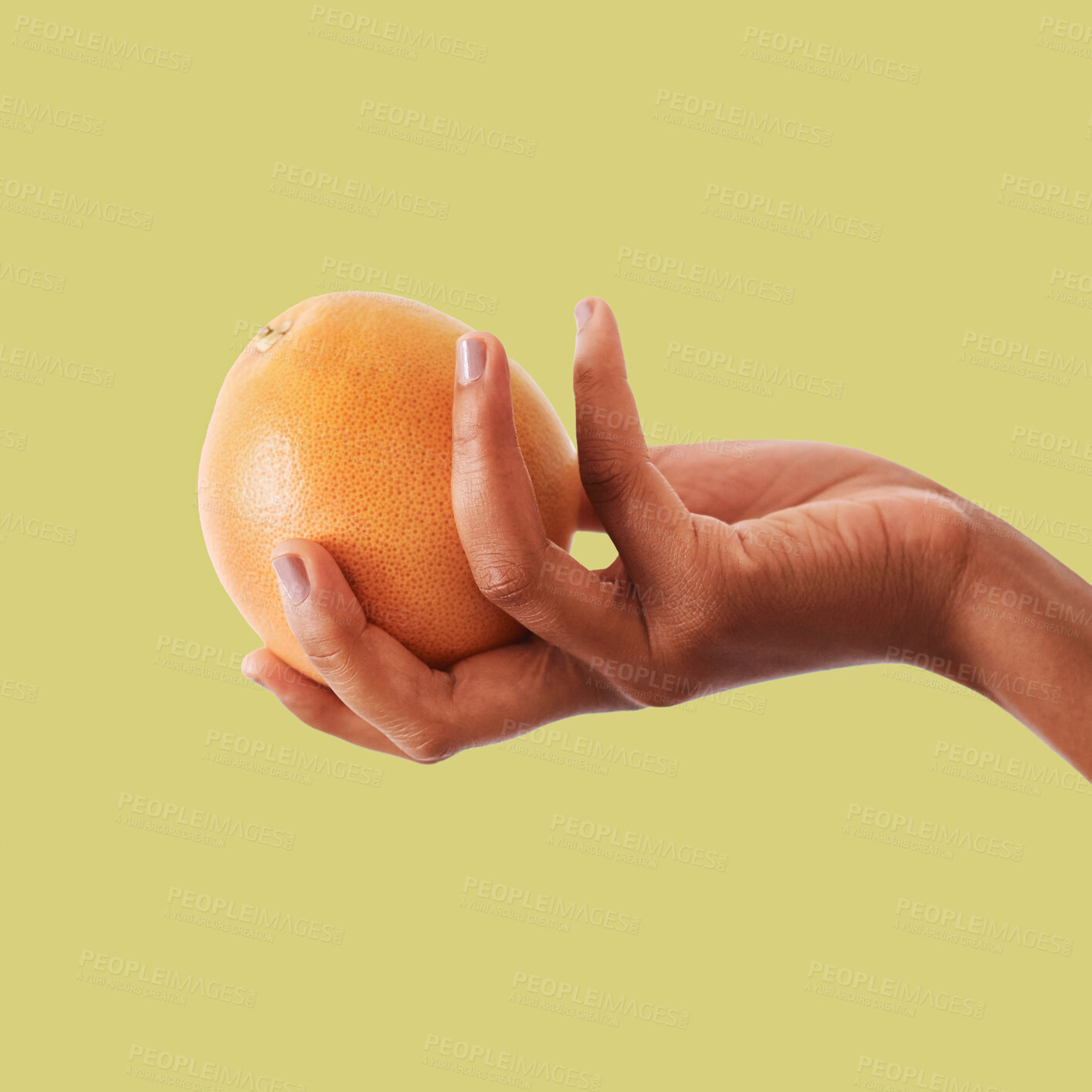 Buy stock photo Hands, orange and fruit for vitamin C, healthy diet plan or nutrition against a studio background. Hand holding fruity food, nectarine or grapefruit for health, organic wellness or citrus on mockup