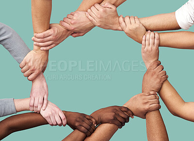 Buy stock photo People, diversity and hands together in teamwork collaboration for trust against a studio background. Diverse group holding hand in unity or solidarity for community or agreement in circle on mockup