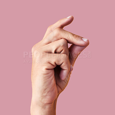 Buy stock photo Click, finger snap and hand of man in studio for attention, ok and idea expression isolated on pink background. Sound, natural and yes with person and flick gesture for action, success and easy