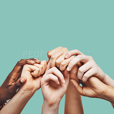 Buy stock photo Praying, hands and people united in prayer, worship or community encouragement in studio. Diversity, pray and worship by group in church for praise, help or hope, blessing and God on green background